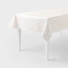 a white table with sprinkles on it