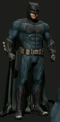 a man dressed as batman standing in front of a black background