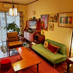 a living room filled with furniture and decor