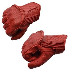 pair of red leather gloves with perfored palm and thumb holes on white background