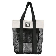 Chanel Mesh Logo Retro Sport Gym Shopper Tote Bag 2003 {VINTAGE 19 Years} Top handles Rubber printed logo at front Contrasting panels Top zip closure Internal zippered pocket 15" H x 12.2" W x 3.5" D Handle drop 8.3" Made in Italy Chanel Tote Bag, Logo Retro, Mesh Tote Bag, Gym Tote, Chanel Brand, Vintage Tote Bag, Chanel Tote, Retro Sport, Retro Logos