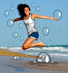 a woman is jumping in the air with soap bubbles floating around her and an image of a smiley face