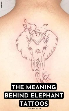 an elephant tattoo on the back of a woman's shoulder and neck, with text that