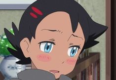 an anime character with blue eyes and black hair