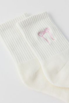 Ultra-soft crew socks with iconic detailing at the ribbed cuff. Features Icon quarter crew socks Super soft crew socks Icon detailing at the ribbed cuff Content + Care 80% Cotton, 18% polyester, 2% spandex Machine wash Imported Size + Fit Quarter crew length Fits US women’s shoe size 6–10 | Icon Quarter Crew Sock in White/Pink Bow, Women's at Urban Outfitters Cute Things For Wishlist, Trendy Stocking Stuffers, Girly Stocking Stuffers, Cute Pink Socks, Cute Socks For Women, Urban Outfitters Coquette, Pink Socks Aesthetic, Cute Crew Socks, Coquette Things To Buy