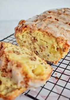 a loaf of cake sitting on top of a cooling rack