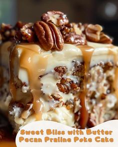 a close up of a piece of cake with pecans on top and caramel drizzle