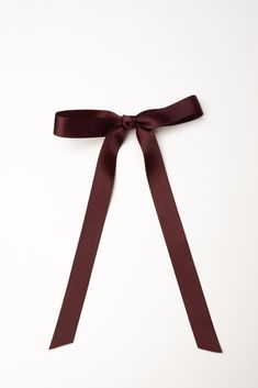 Pretty, flowing satin ribbon bow with beautiful trailing tails 7 lovely color choices Single tied bow - approximate measurement - 6" Long ribbon tails - approximate measurement - 8" Metal spring barrette Ribbon Aesthetic, Satin Hair Bow, Getaway Dress, Plum Hair, Brown Ribbon, Occasion Dresses Wedding, Pre Black Friday, Metal Spring