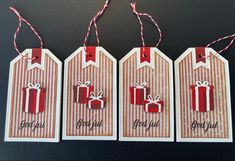 three tags that say god you and have red gift boxes with bows hanging from them