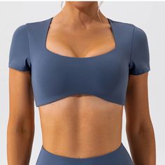 This crop top offers a snug fit that moves with your body, providing the ultimate comfort during intense workouts or casual jogs. The moisture-wicking material keeps you dry, while the stretchable fabric ensures a full range of motion, allowing you to focus on your fitness goals without any distractions. SPECIFICATIONS Product Material: Active Shirt Tops Feature: Breathable The Craft of Weaving: Knitted Women Active Wear, Square Crop Top, Top Run, Bra Crafts, Slim Fit Crop Top, Gorgeous Prom Dresses, Yoga Shirt, Activewear Sets, Denim Romper