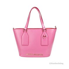 Style: Marc Jacobs Small Candy Pink Tote Crossbody Bag Material: Saffiano Leather Features: Adjustable/Detachable Crossbody Strap, Fabric Lined, Zip Closure, Inner Zip Pocket Measures: 9" L x 7.5" H x 4.5" D Size: S.  Gender: female.  Age Group: adult. Pink Tote, Candy Pink, Pink Candy, Crossbody Strap, Cloth Bags, Leather Tote, Marc Jacobs, Gender Female, Zip Pockets