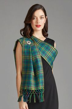 Wearing a sash for an evening dress is very traditional when it comes to Highland Dress. The ways of wearing one have different meanings, this pin focuses on the style worn by clanswomen, which is the most popular way of wearing a sash. 

According to Scottish traditions, it is folded in half width and worn over the right shoulder, fastened by a pin or small brooch. In doing so, the sash will have equal loose lengths to the front and back while neatly lying against the chest. Female Scottish Outfit, Traditional Scottish Dress For Women, Scottish Traditional Dress Women, Burns Night Outfit Ladies, How To Wear A Tartan Sash, Scottish Formal Wear, Scottish Sash For Women, Scotish Clothes Traditional Women, Scottish Women Fashion