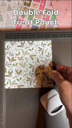 someone is making a paper christmas card with the words, double fold treat pouch