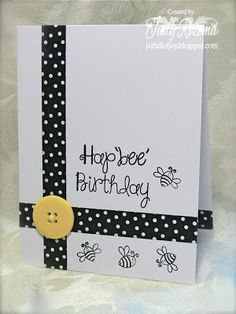 a birthday card with a button on the front and polka dot trimming around it