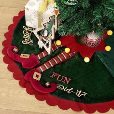 a christmas tree skirt with stockings on it