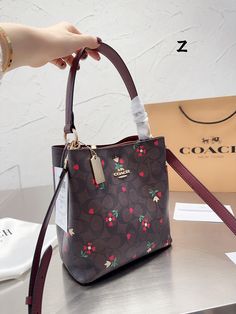 The-Bag-Enclave - CCH Bags - 338 A+ Excellent Quality copies; Contact us if you've any questions in your mind. Bag Women Fashion, Drawstring Bags, Designer Bag, Branded Handbags, Printed Bags, Buckets, Crossbody Purse, Fashion Designers, Luxury Handbags