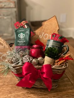 a basket filled with coffee and tea on top of a wooden table