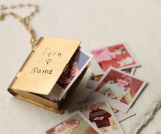 a small box that has some pictures on it with the words fem and mamma written on it