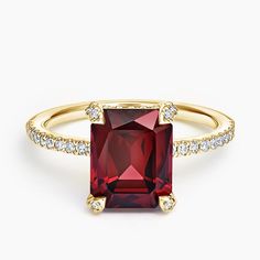 Festivity Garnet and Diamond Cocktail Ring - 18K Yellow Gold. A bold Moyo Gems garnet takes centerstage in this moody, limited edition design. Pavé diamonds adorn the prongs and band for a hint of sophisticated shimmer (1/3 total diamond carat weight).. 
 
 Moyo Gems, an ethical gemstone collaboration, works to empower female artisanal miners to work safely, mine better, and improve their financial security while furthering equitable fair trade markets. Moyo offers gems with stunning cuts, strik Financial Security, Diamond Cocktail Ring, Gold Cocktail Ring, Diamond Cocktail Rings, Diamond Carat, Cocktail Ring, Cocktail Rings, Pave Diamonds, Fair Trade