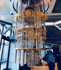 the ibm quantum computer is hanging from the ceiling