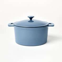 a blue casserole dish on a white background