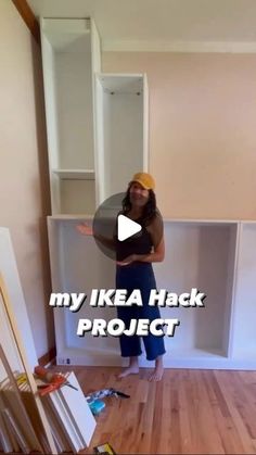 a woman standing in front of a book shelf with the words, my ikea hack project