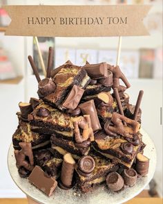 a birthday cake made to look like it has chocolate and cookies on top