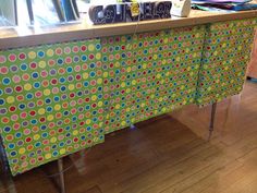 a counter with many different colored dots on it