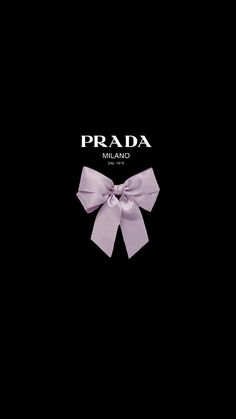 a black wall with a pink bow on it's side and the words prada mall