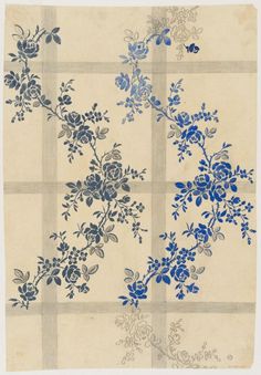 blue and white flowers are on a checkered tablecloth