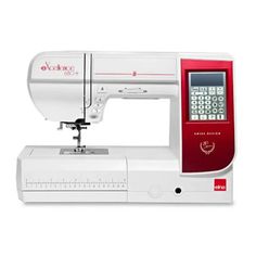 the sewing machine is red and white with a button on it's side,