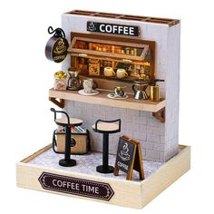 a miniature coffee shop is on display