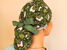 Our ponytail scrub caps are designed with a splash of colorful cotton prints that bring a smile to your face and your coworkers, keeping your medium-length hair tied up securely throughout your shifts. Perfect surgical cap for those who prefer to wear a low bun hairstyle. Discover more fun and expressive surgical caps in a variety of colors, patterns, and styles from our shop: ➤Scrub caps euro ➤ https://etsy.me/3223EjX ➤Bouffant scrub hats ➤ https://etsy.me/2TGotwq ➤Ponytail scrub cap➤ https://etsy.me/2HMO7gt ✸Use our 𝗦𝗮𝘁𝗶𝗻 𝗟𝗶𝗻𝗶𝗻𝗴 𝗼𝗽𝘁𝗶𝗼𝗻 in our scrub caps to keep your haiir soft & moisturized! ✸𝗔𝗱𝗷𝘂𝘀𝘁𝗮𝗯𝗹𝗲 𝗙𝗶𝘁:  Thanks to the ribbons ponytail scrub caps are adjustable. ✸𝗦𝗼𝗳𝘁 𝗦𝘄𝗲𝗮𝘁𝗯𝗮𝗻𝗱: Each cap features a soft sweatband that encircles your 𝗳𝗼𝗿𝗲 Floral Ponytail, Low Bun Hairstyle, Bouffant Scrub Caps, Ponytail Scrub Hat, Bouffant Scrub Hat, Low Bun Hairstyles, Name Embroidery, Bun Hairstyle, Everyday Heroes