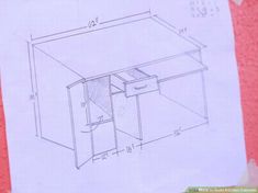 a drawing of a desk with two drawers and one drawer on the bottom, in front of a piece of paper