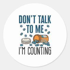 a round sticker that says don't talk to me i'm counting