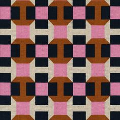 a pink and black checkered pattern on fabric