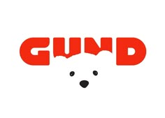 the word gund written in red with a bear's head