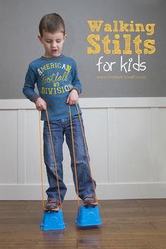 a young boy standing on top of blue plastic boots holding an orange rope with the words walking skills for kids above him