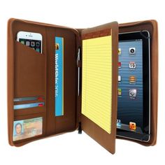 an ipad case with notepad and pen inside