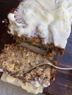 a close up of a piece of cake with icing