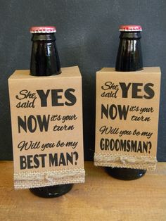 two beer bottles with funny labels on them