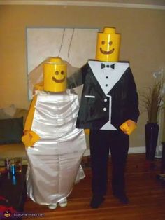 a bride and groom made to look like legos are standing in the living room