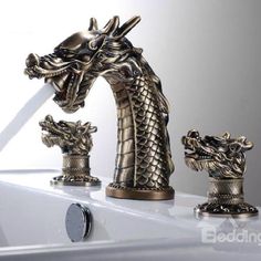 a dragon faucet is shown with three other faucets in front of it