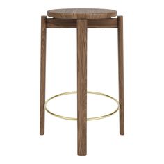 a wooden stool with a metal ring on the bottom and an open seat at the top