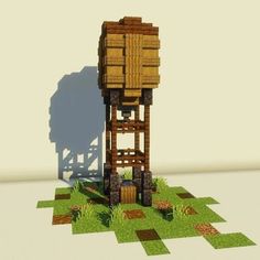 a small wooden structure sitting on top of grass