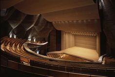 an empty auditorium filled with lots of seats