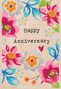 a happy anniversary card with flowers on it