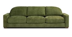 a green couch sitting on top of a white floor