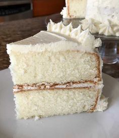 a slice of white cake on a plate