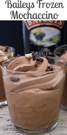 two glasses filled with chocolate mochaccino and topped with whipped cream